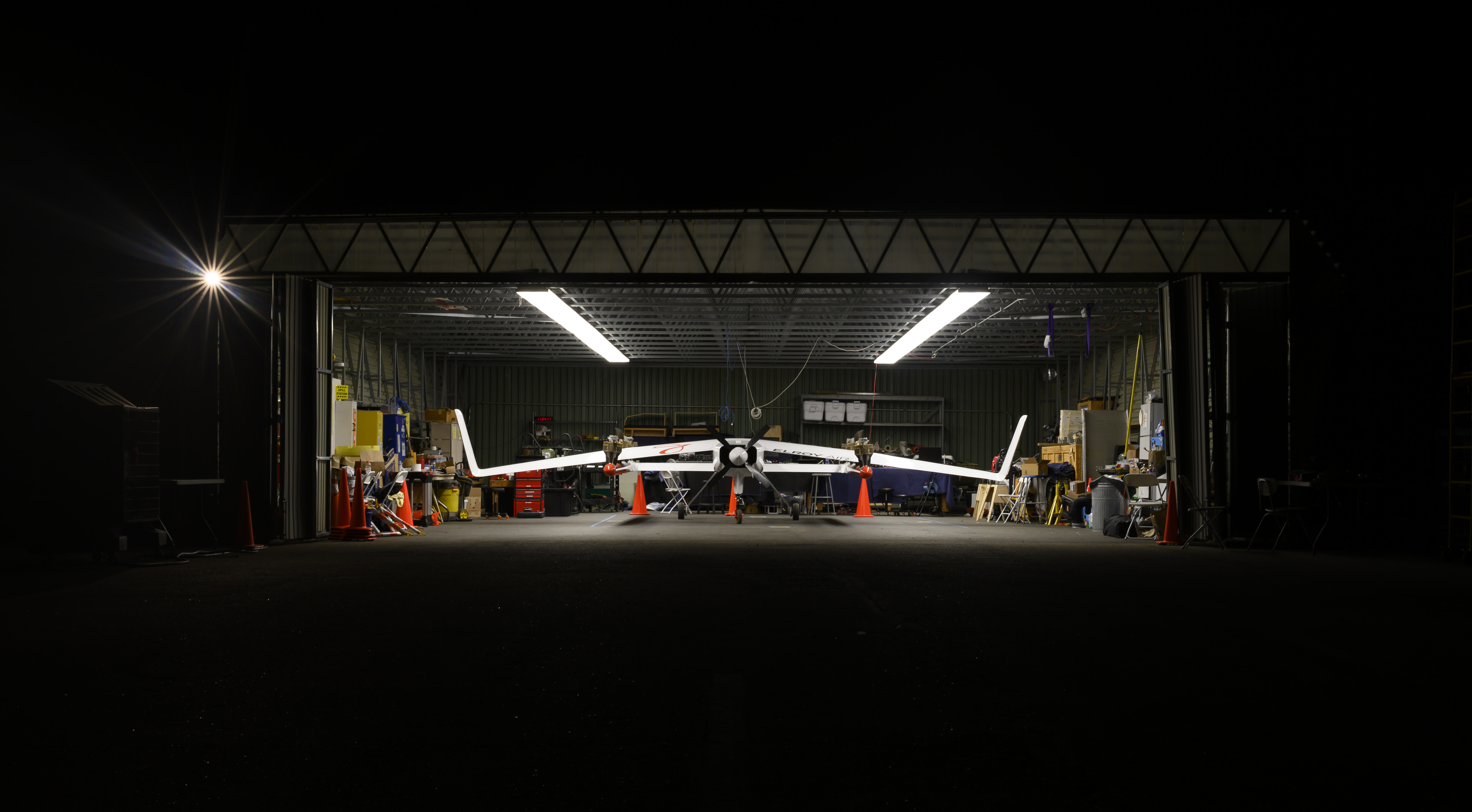 Photo of an Elroy vertical take off and landing aircraft in hangar.