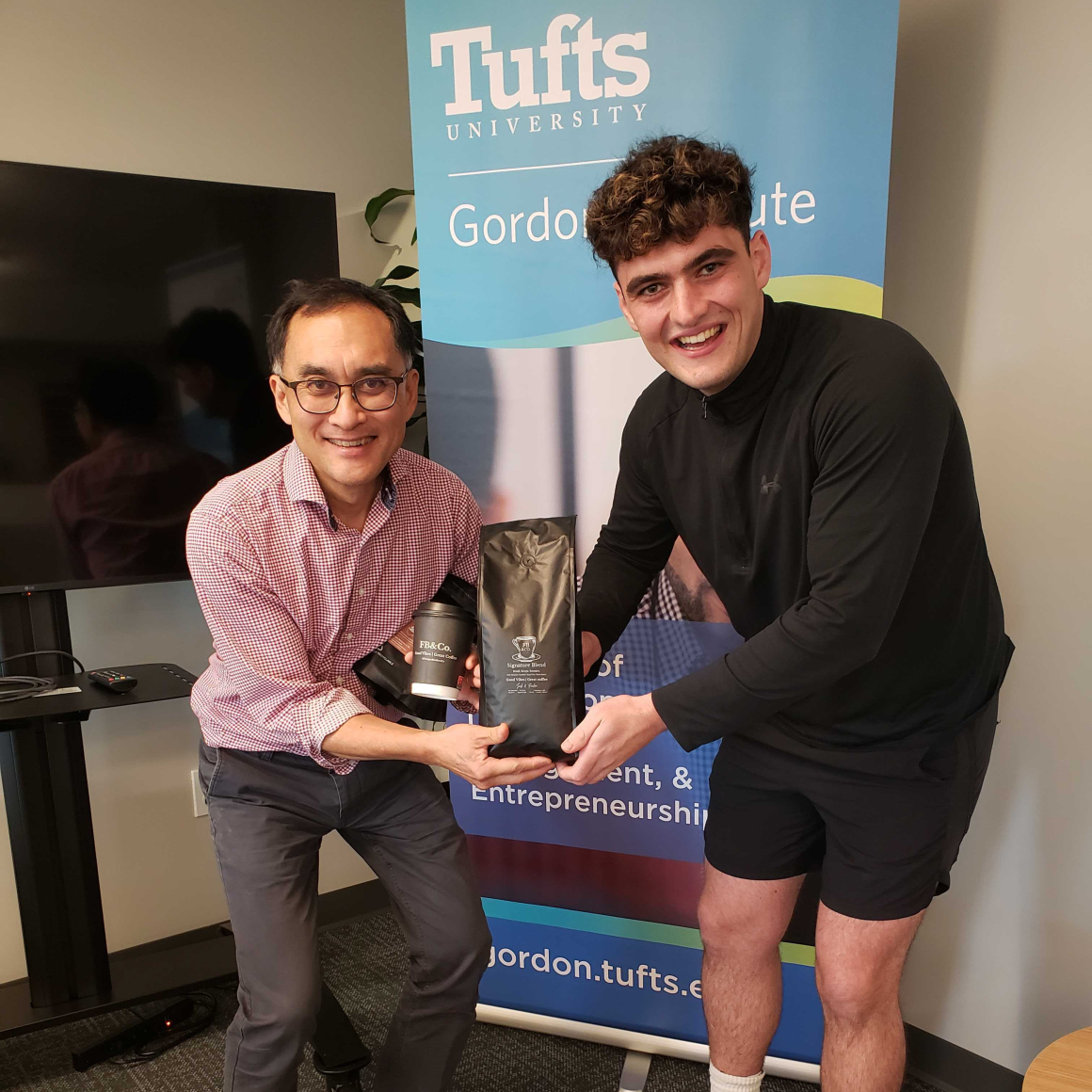 Fiachra Finegan, MSIM '23, (right) with Kevin Oye, Executive Director of Tufts Gordon Institute (left)