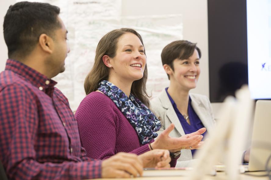 Student engaged in lecture with classmates