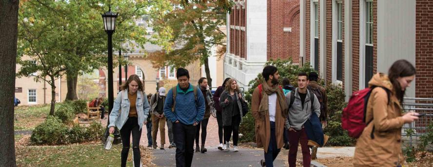 Students walking outside at Tufts University campus